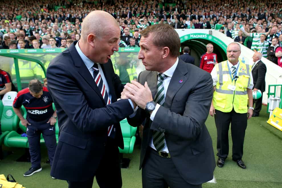 Rangers manager Mark Warburton (left) could not stop Celtic's rampant run under Brendan Rodgers - now he says it is time the Light Blues built a dynasty of dominance