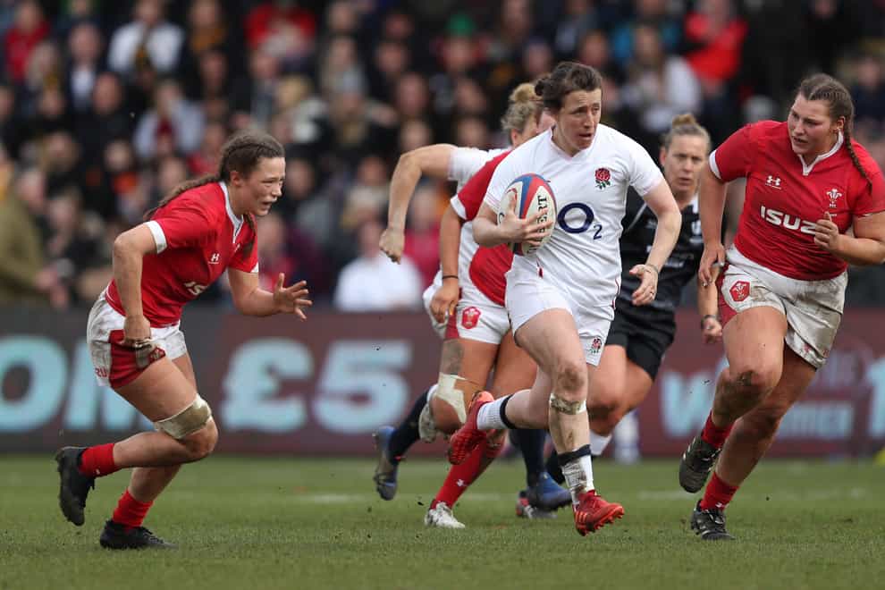 England’s Katy Daley-Mclean breaks to score a try for England