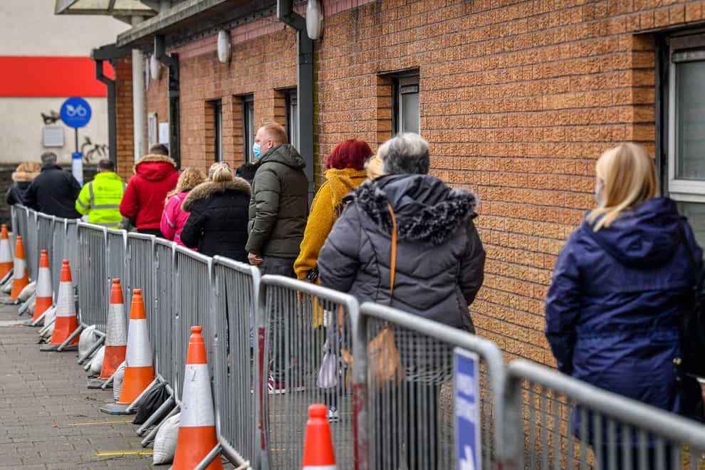 People queue for vaccines in Wales (Ben Birchall/PA)