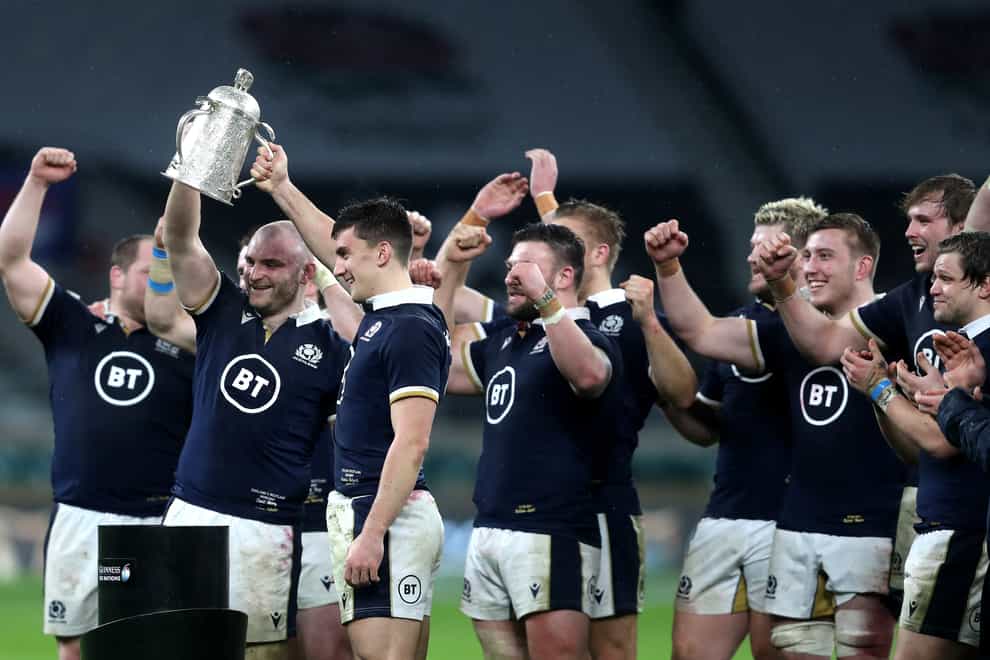 Dave Cherry, second left, lifts the Calcutta Cup after his first Scotland cap