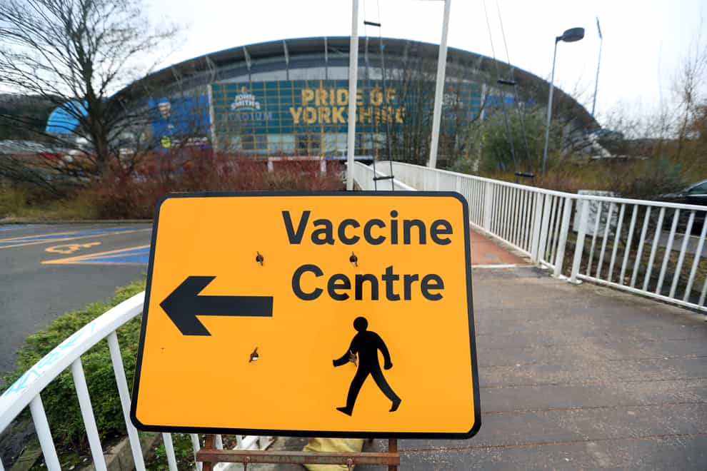 Signage to a vaccine centre near the John Smith’s Stadium, Huddersfield (PA)