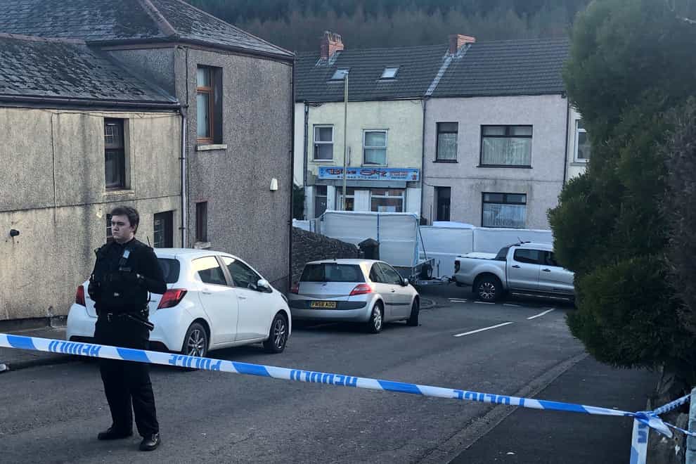 Police at the scene after the incident in the village of Ynyswen