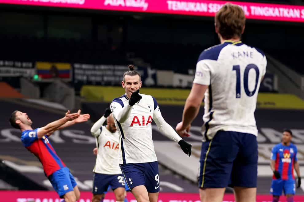 Gareth Bale, centre, celebrates with Harry Kane, right, after scoring against Crystal Palace