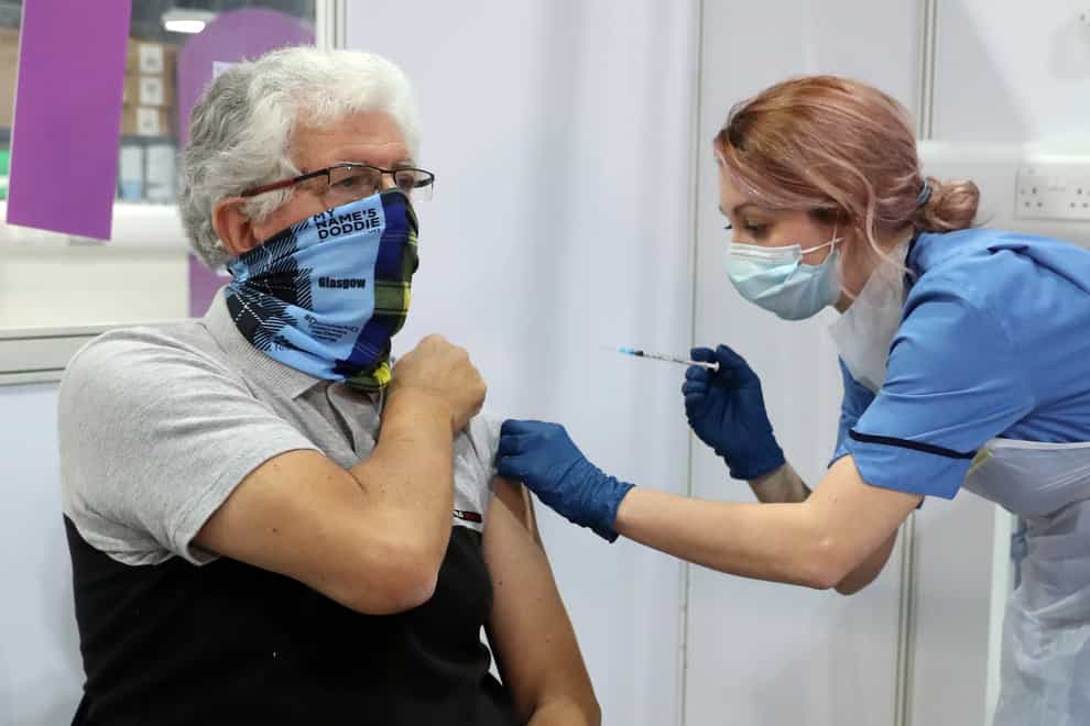 A man receiving an injection