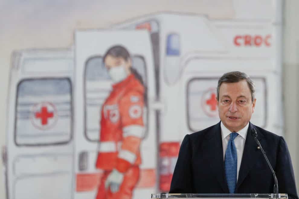 Italian premier Mario Draghi speaks after visiting a Covid-19 vaccination centre, at the Rome Leonardo Da Vinci airport in Fiumicino
