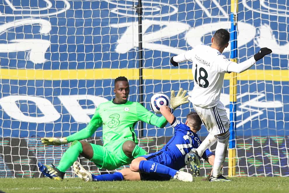 Raphinha’s shot is saved by Chelsea goalkeeper Edouard Mendy