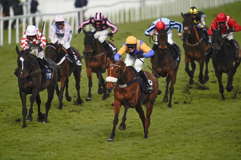 Flirtatious Girl (centre blue/yellow) comes home in front at Sandown