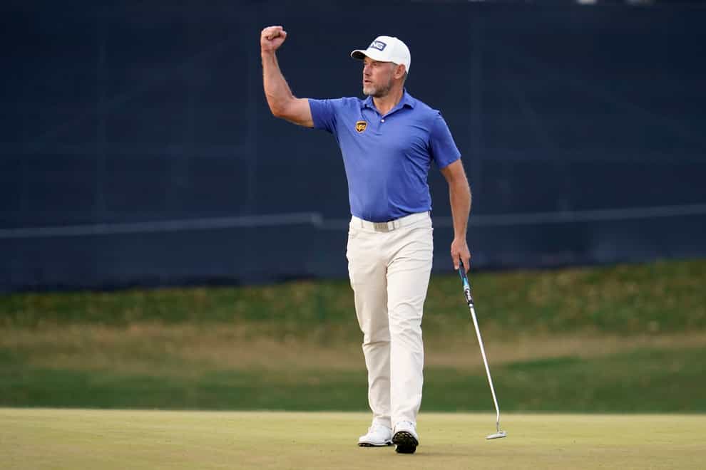 Lee Westwood celebrates his birdie at Sawgrass' famed 17th hole
