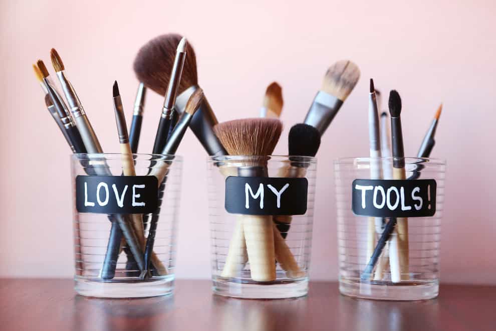 make-up brushes in jars