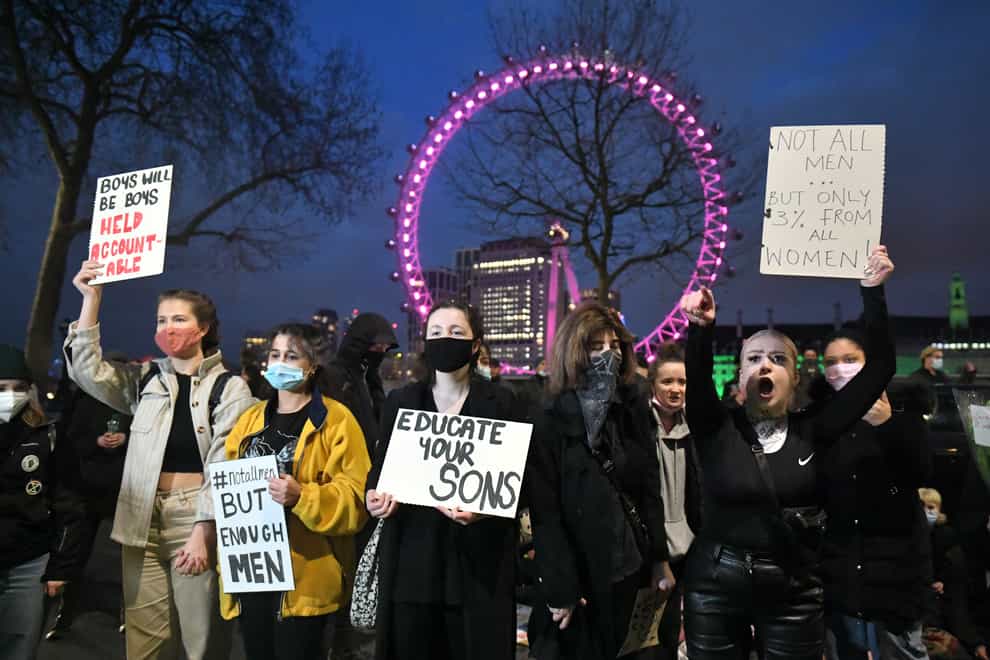 Demonstrators protest outside New Scotland Yard following the killing of Sarah Everard