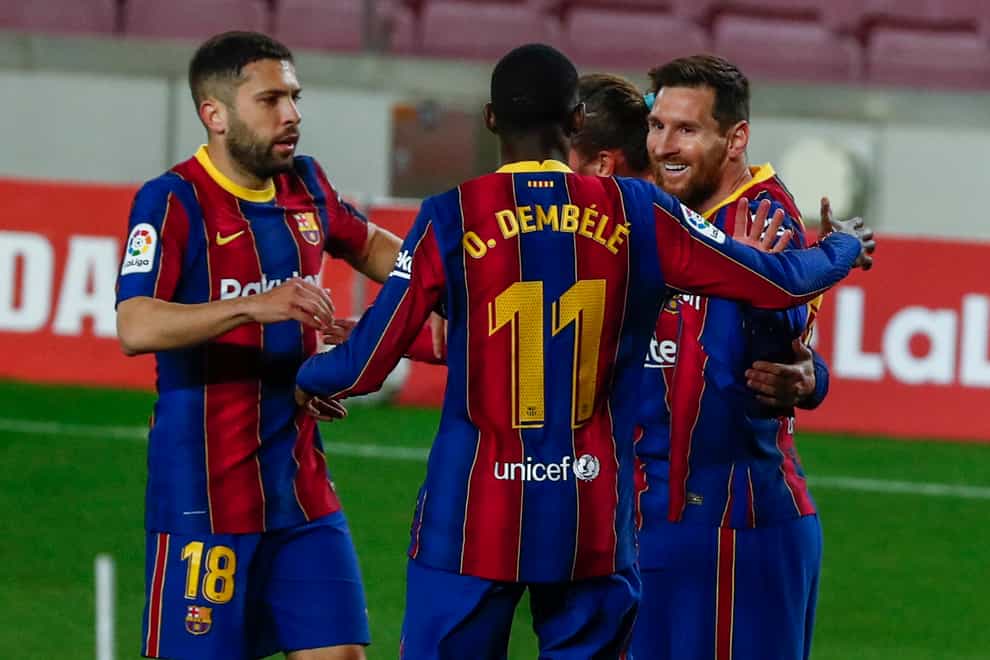 Lionel Messi (right) celebrates
