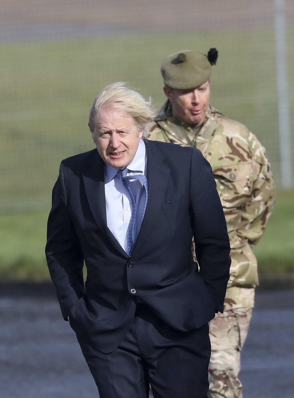 Prime Minister Boris Johnson is greeted by Brigadier Chris Davies, Commander 38 (Irish) Brigade, during a visit to Joint Helicopter Command Flying Station Aldergrove in Northern Ireland (Peter Morrison/PA)