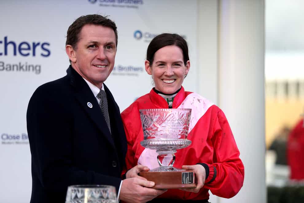 Sir Anthony McCoy presenting Rachael Blackmore with a trophy at the 2019 Cheltenham Festival