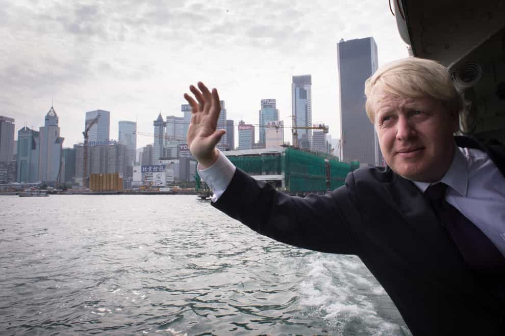 Boris Johnson, then mayor of London, takes the Star Ferry from Hong Kong island to Kowloon (Stefan Rousseau/PA)