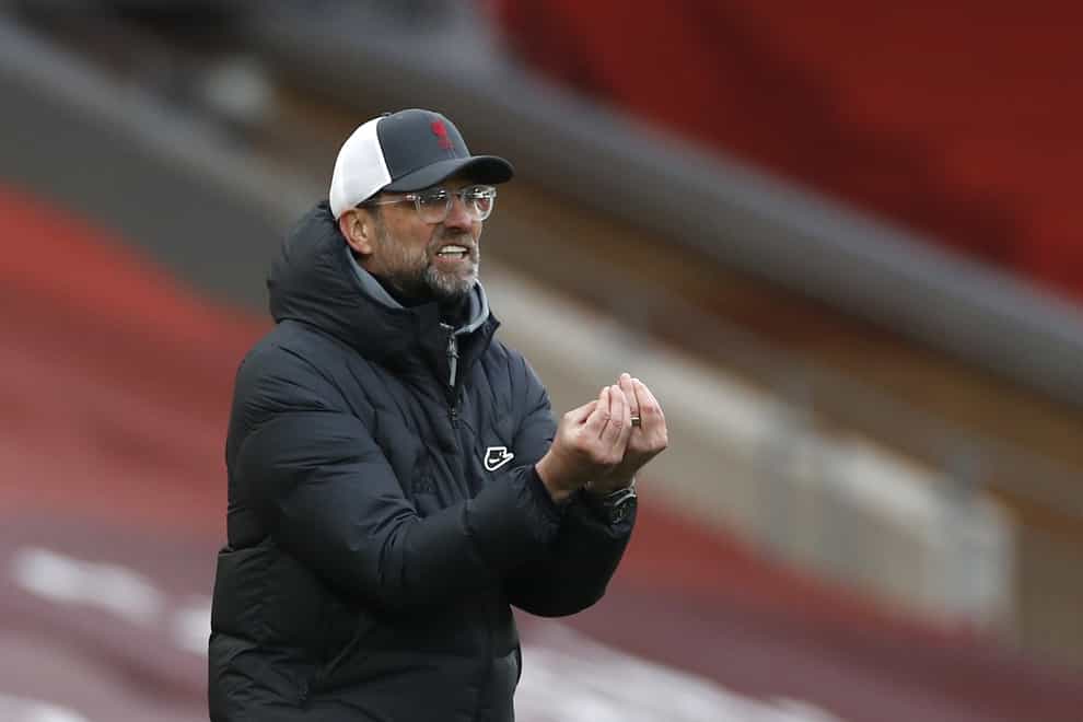 Liverpool manager Jurgen Klopp clasps his hands together on the touchline