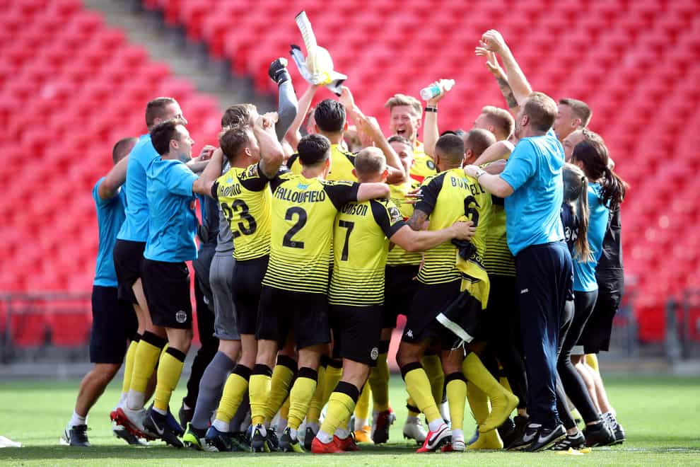 Harrogate celebrated a first promotion to the English Football League at an empty Wembley Stadium