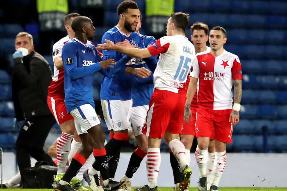 Connor Goldson (centre) reacts furiously to claims of racist abuse