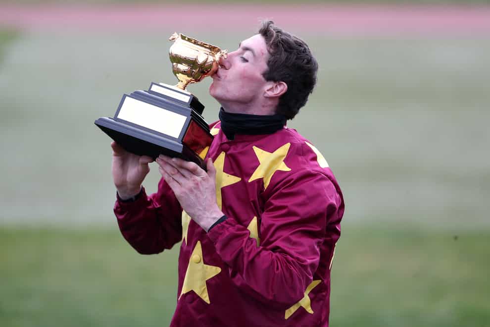Jack Kennedy gives the Cheltenham Gold Cup a kiss