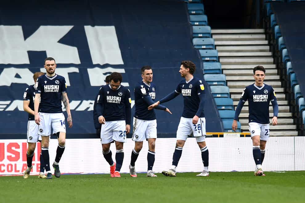 Millwall players celebrate after Middlesbrough’s Grant Hall scored an own goal
