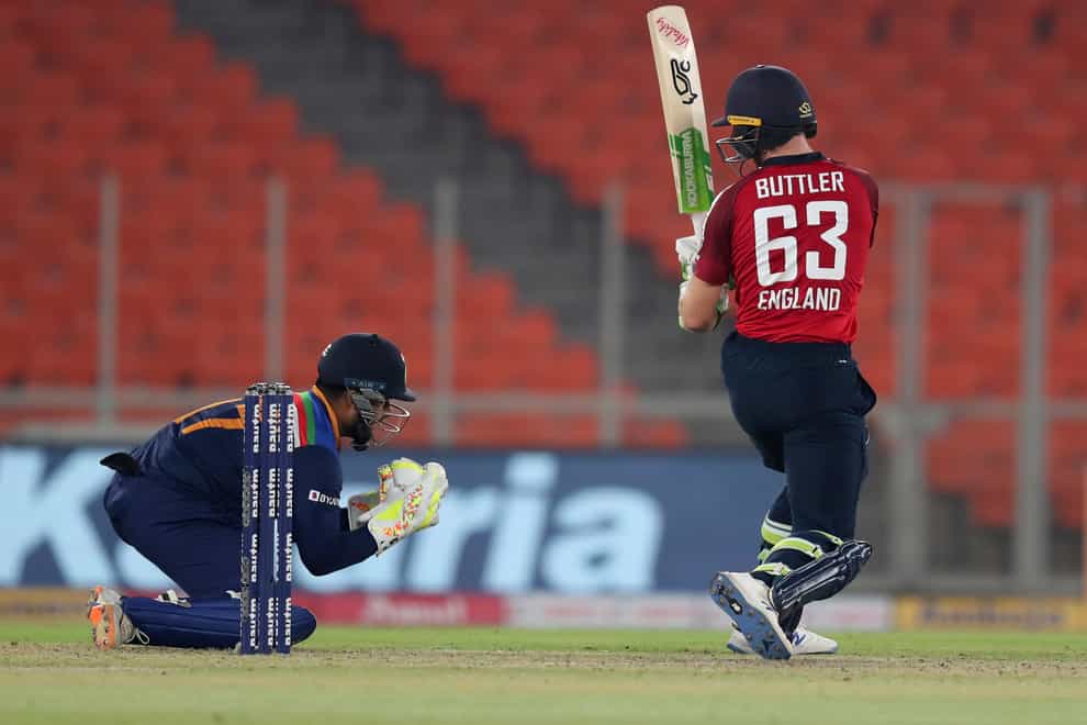 Jos Buttler, right, was unable to help England to victory