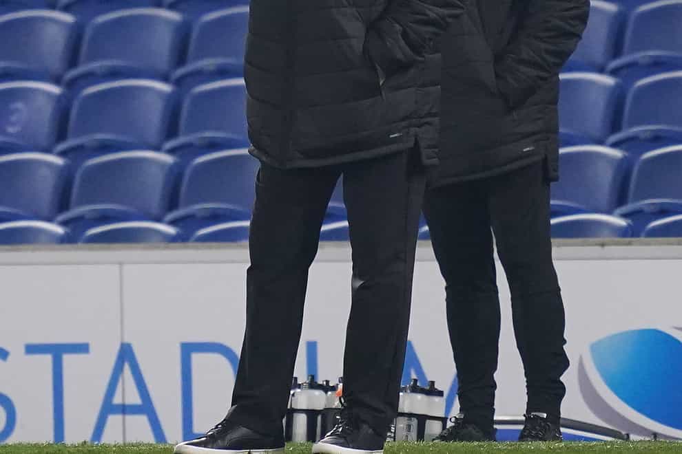 Newcastle boss Steve Bruce, left, cut a dejected figure in Saturday's defeat at Brighton