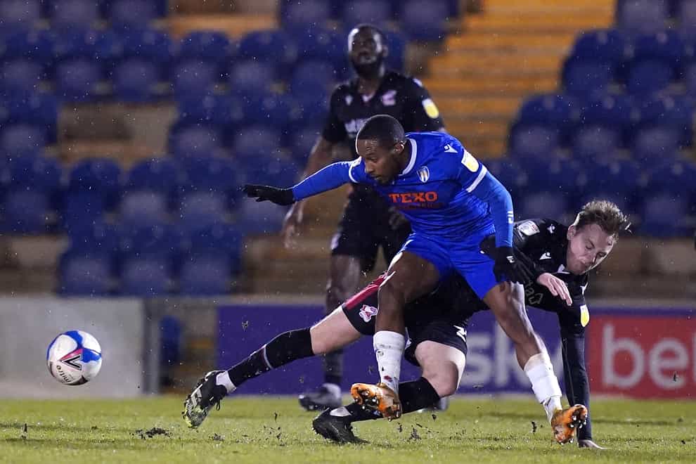 Colchester winger Callum Harriott (front) is away with Guyana