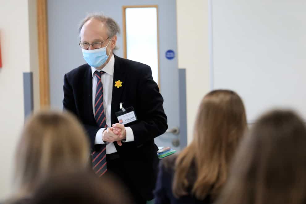 Education Minister Peter Weir speaks to pupils during a visit to Wallace High School in Lisburn (Peter Morrison/PA)