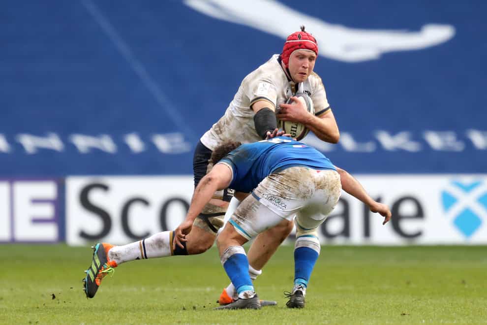 Grant Gilchrist, top, in action against Italy