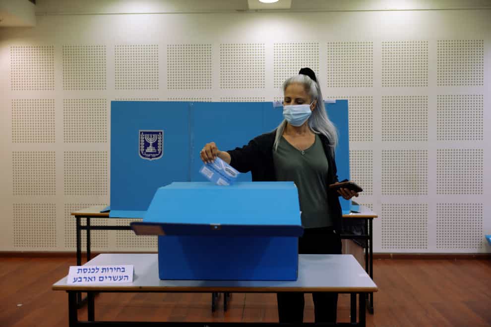 A woman votes in Israel’s election