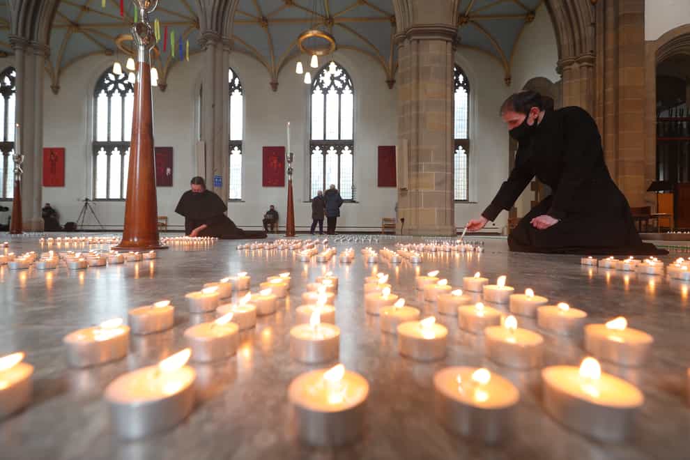 Candles are lit during the national day of reflection at Blackburn Cathedral