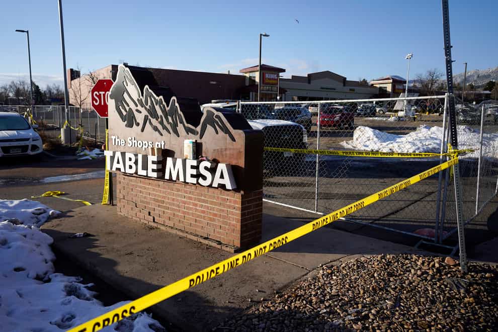 Police tape around the car park outside the supermarket in Boulder, Colorado, where the shooting took place