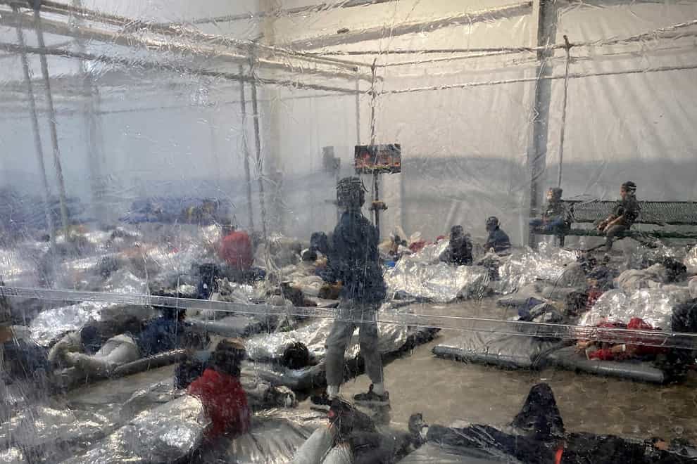 Detainees in a Customs and Border Protection temporary overflow facility in Donna, Texas