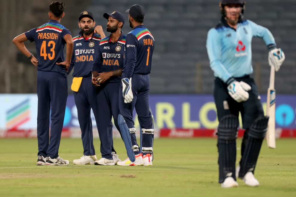 India celebrate the dismissal of England’s Jason Roy