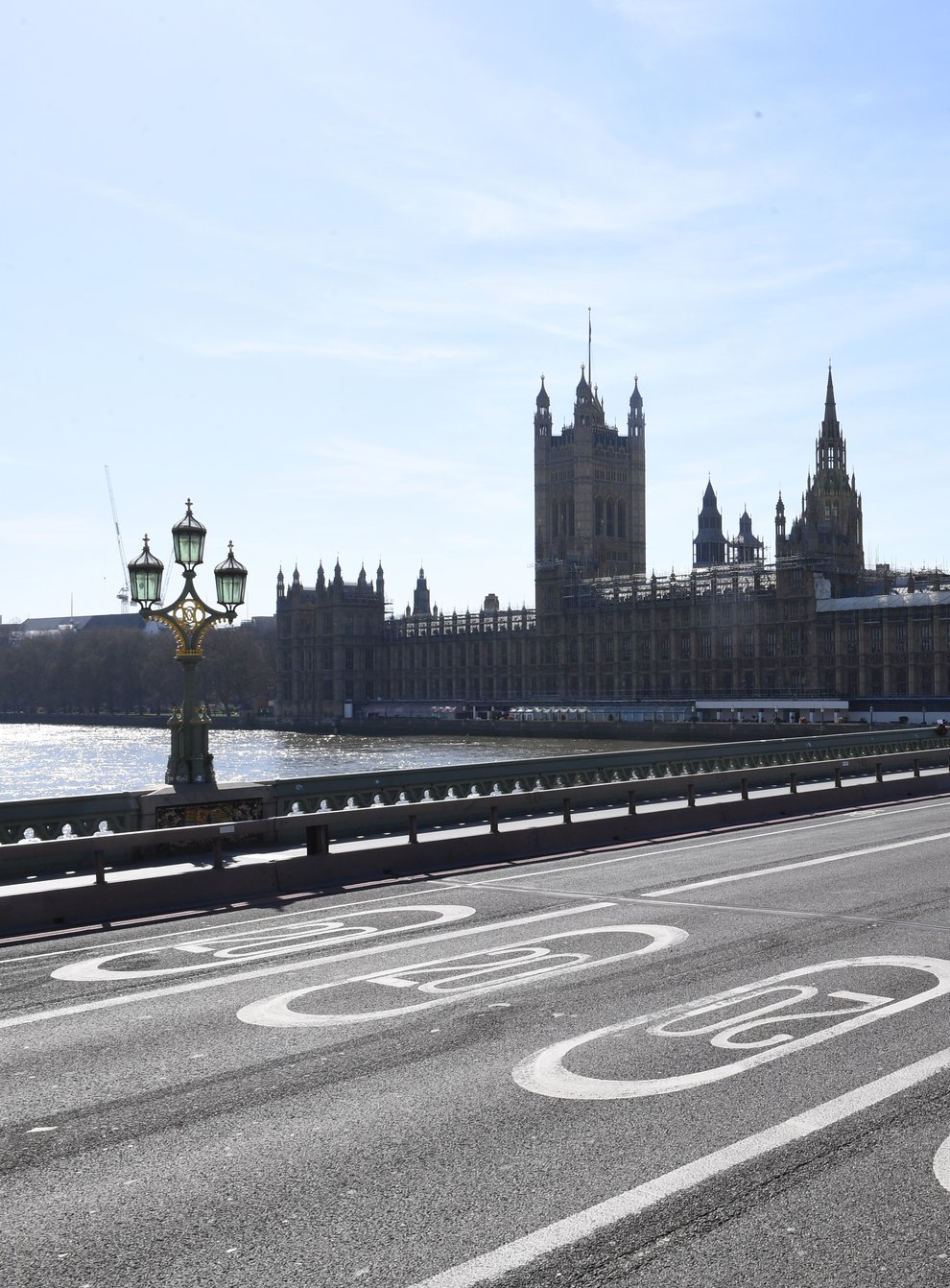 An empty Westminster Bridge and the Houses of Parliament in Westminster, London, the day after Prime Minister Boris Johnson put the UK in lockdown to help curb the spread of the coronavirus