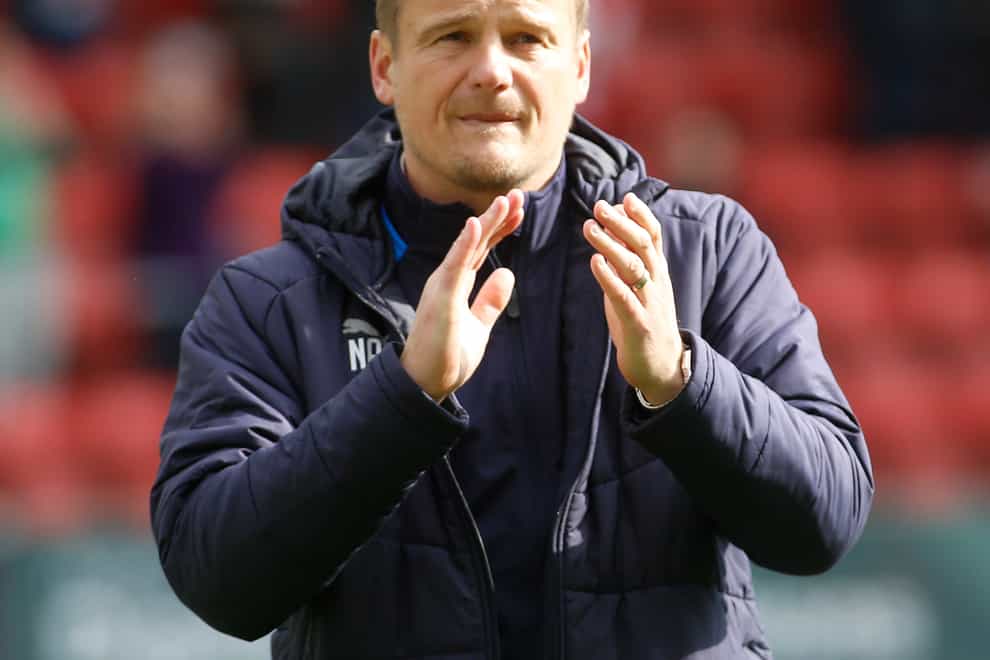 Neal Ardley on the touchline