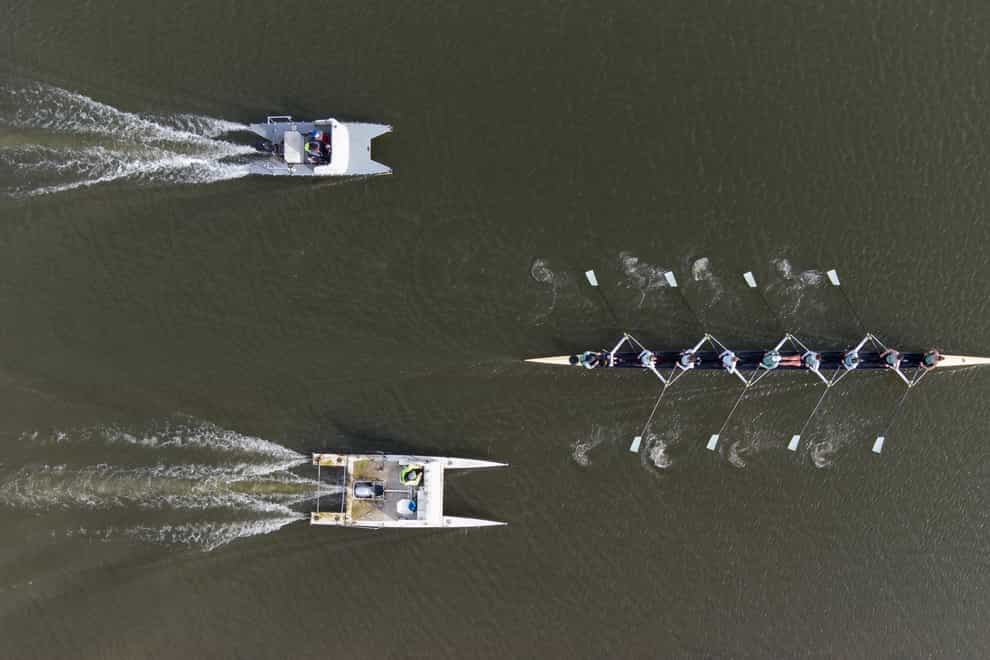 Cambridge University Boat Club women's crew train on the River Great Ouse near Ely in Cambridgeshire ahead of the 2021 Boat Race. (Joe Giddens/ PA)