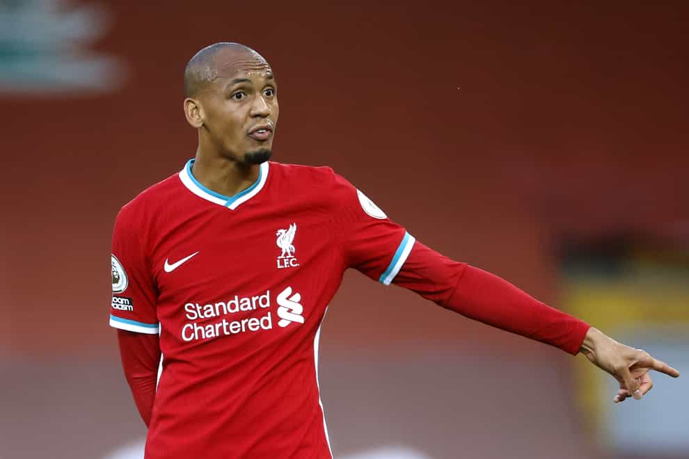 Liverpool midfielder Fabinho points while on the pitch