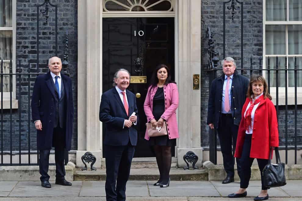From left, Sir Iain Duncan Smith, David Alton, Nus Ghani, Tim Loughton and Helena Kennedy, Baroness Kennedy of The Shaws outside Downing Street