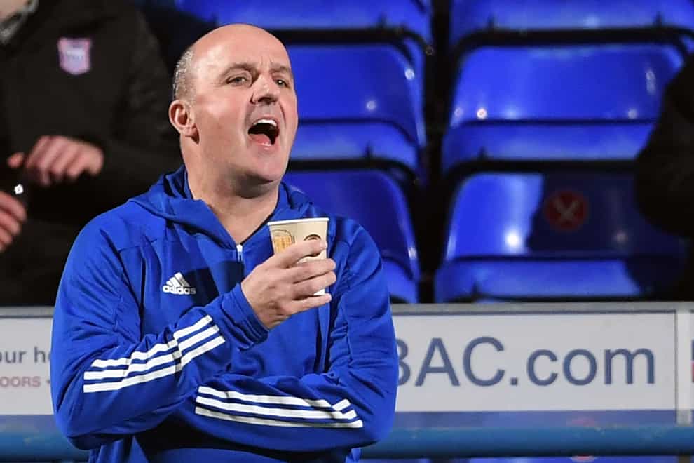 Paul Cook shouts on the touchline