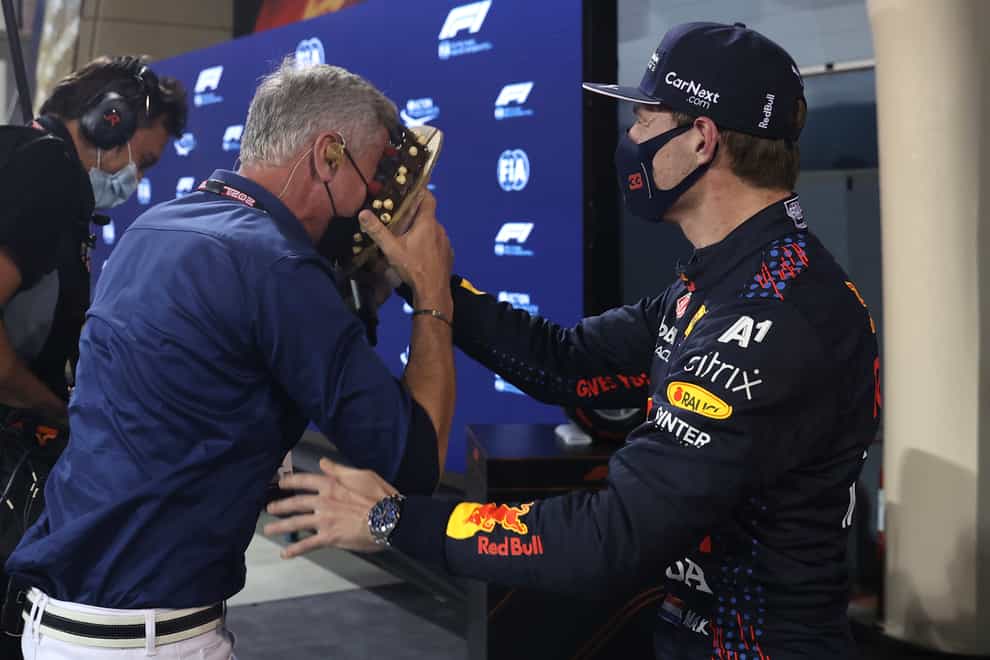 Max Verstappen throws a chocolate cake in David Coulthard's face