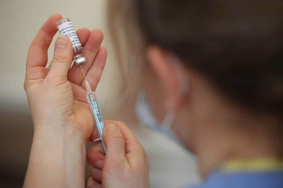 Nurse prepares coronavirus vaccine
