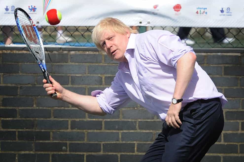 Boris Johnson playing tennis
