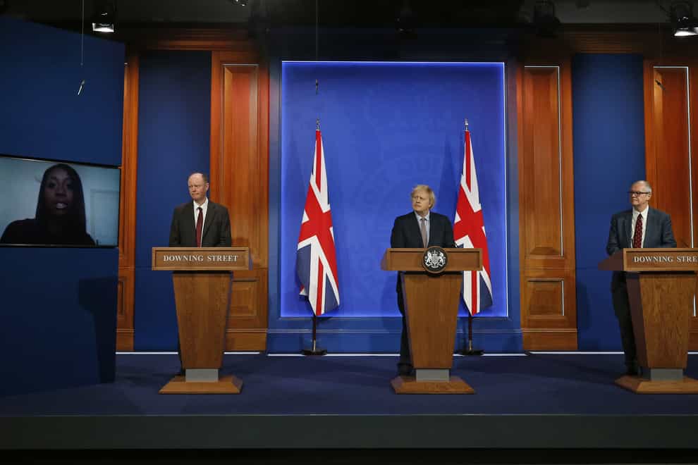 (left to right) England's chief medical officer Professor Chris Whitty, Prime Minister Boris Johnson and England's chief scientific adviser Sir Patrick Vallance in the new briefing room