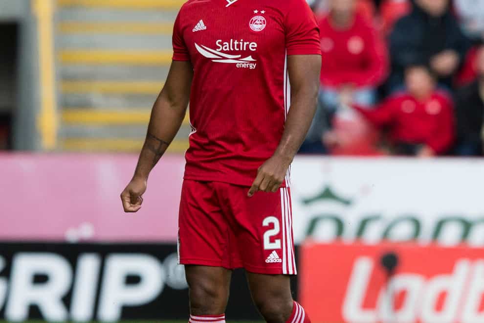 Aberdeen full-back Shay Logan has joined Hearts on loan
