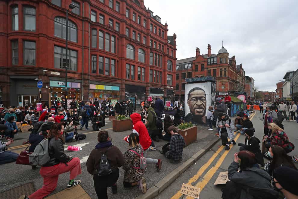 Black Lives Matter demonstrators in St Peter’s Square, Manchester (Peter Byrne/PA)
