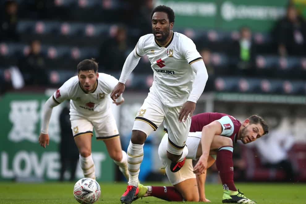 MK Dons’ Cameron Jerome in action against Burnley