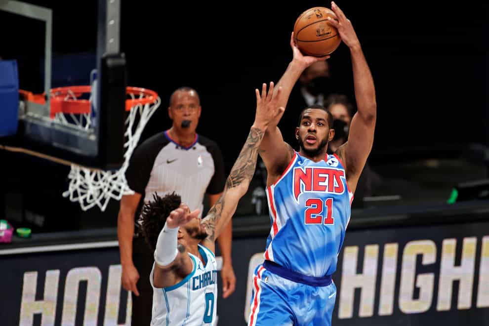 Brooklyn Nets centre LaMarcus Aldridge shoots over Charlotte Hornets forward Miles Bridges