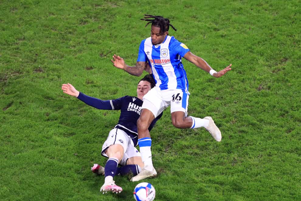 Huddersfield loanee Rolando Aarons, right, has overcome injury
