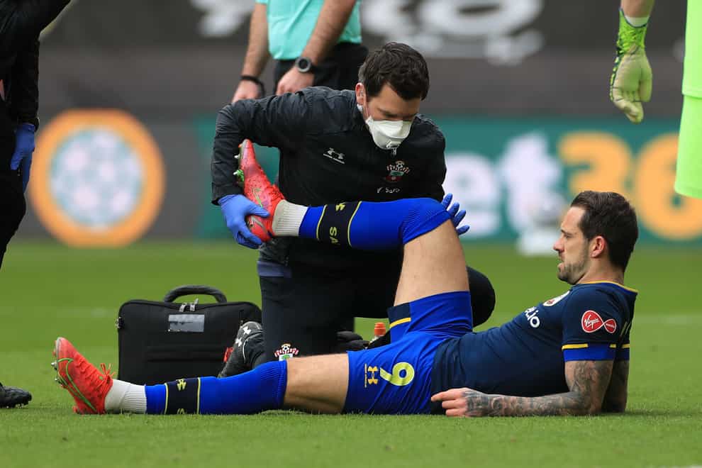 Southampton forward Danny Ings gets treatment on the pitch