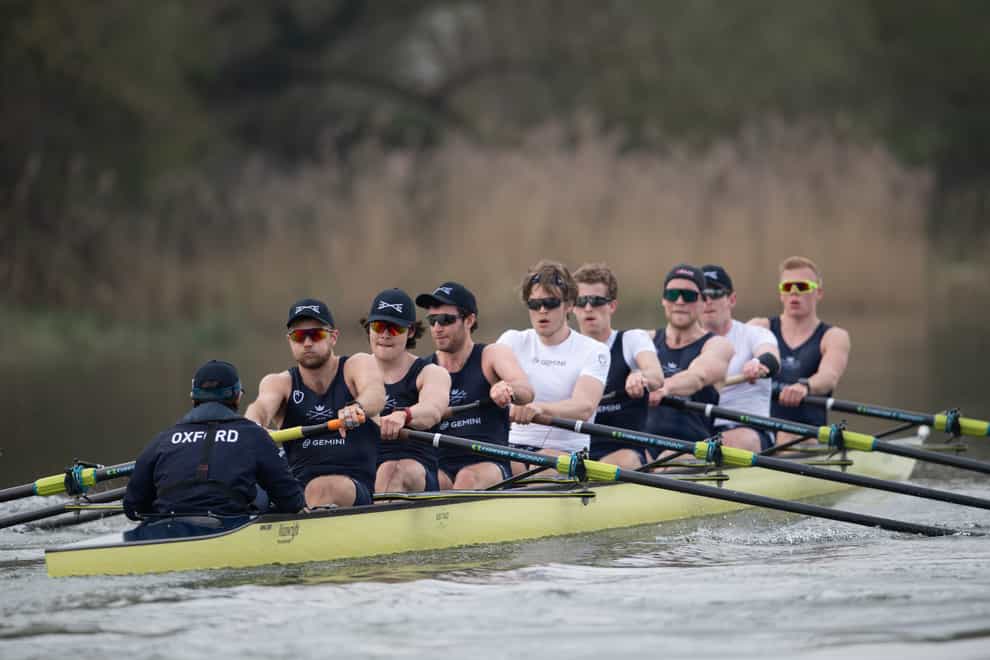 Oxford University Boat Club train on the Great Ouse near Ely in Cambridgeshire